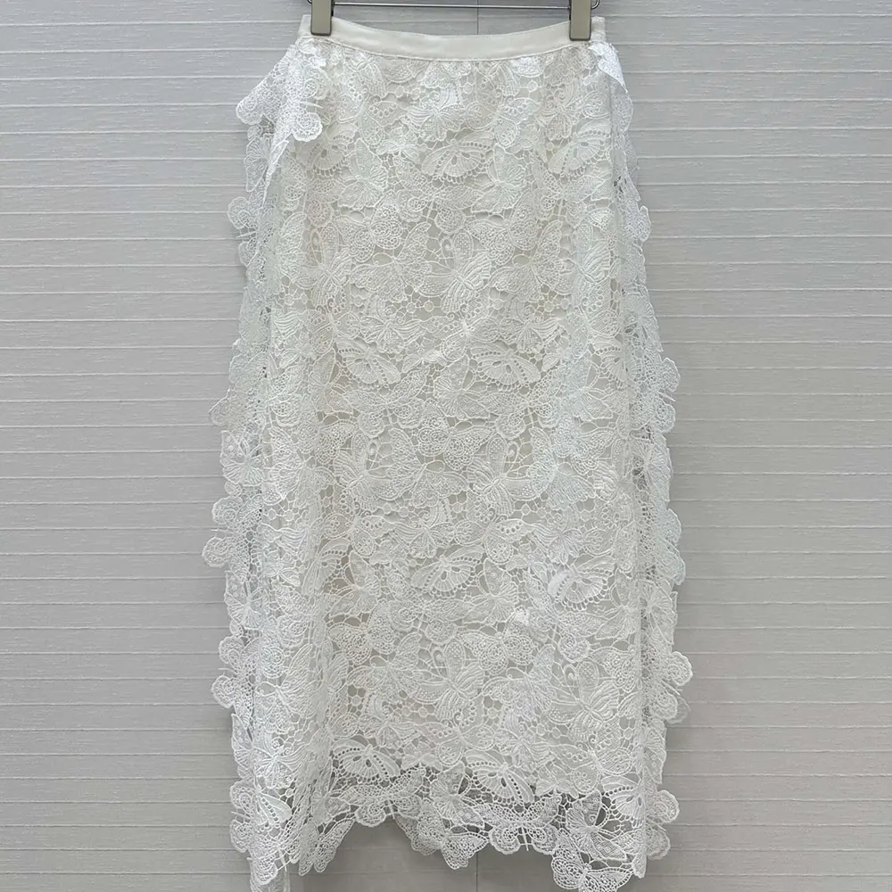 Side angle showing silhouette of Dior Women Mid-Length Skirt Ecru Cotton-Blend Lace