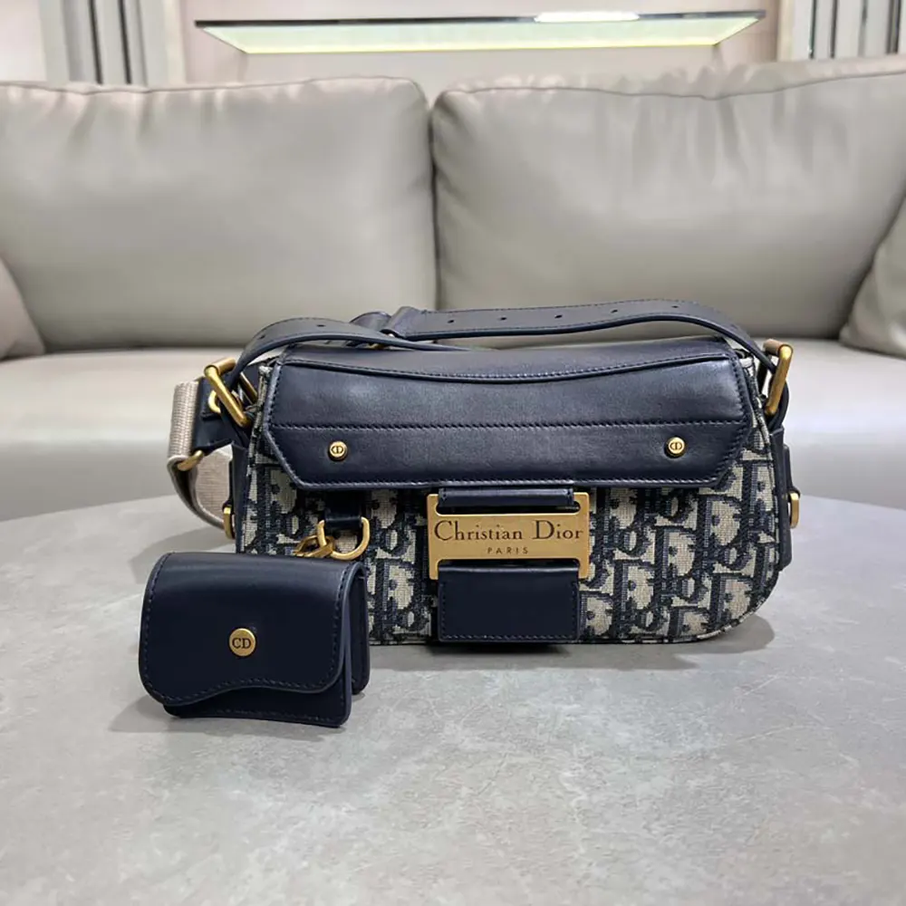 Close-up of smooth calfskin and silver hardware on Dior Small Streetchic Bag