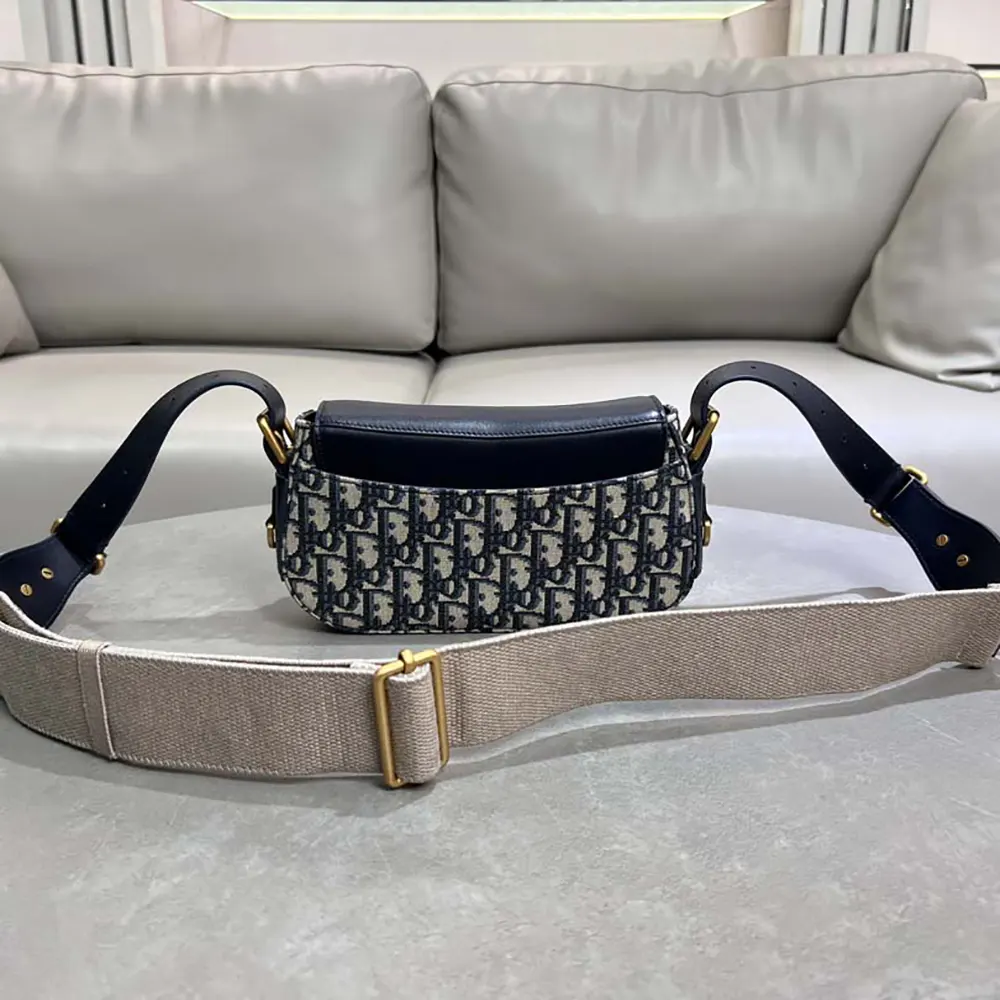 Side angle showing compact silhouette of Dior Women Small Streetchic Bag
