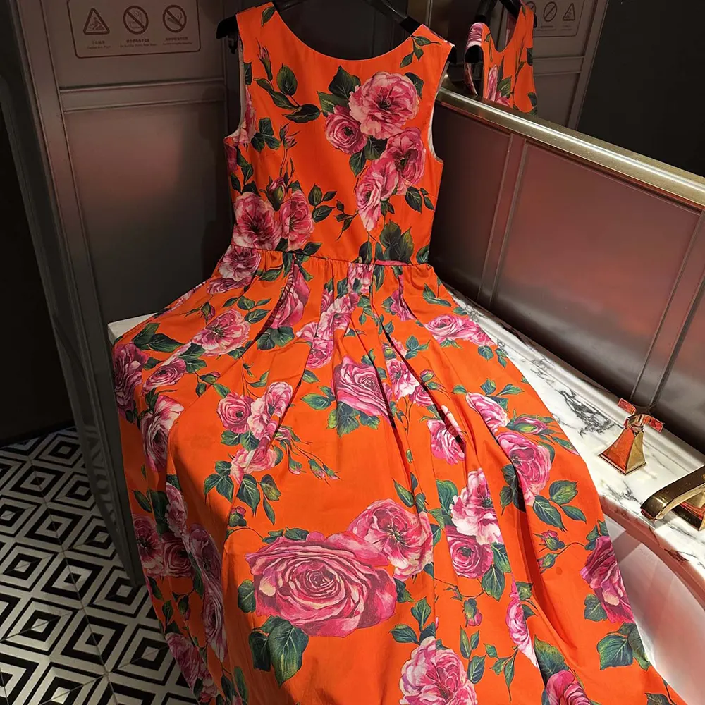 Close-up of rose print and button detail on Dolce Gabbana D&G babydoll dress