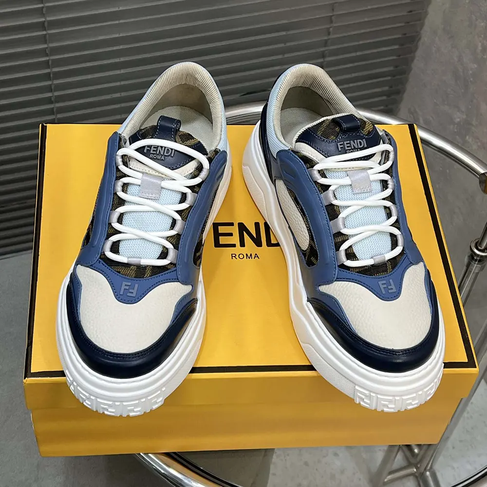 Close-up detail of blue leather panel and embossed logo on Fendi Force Sneakers