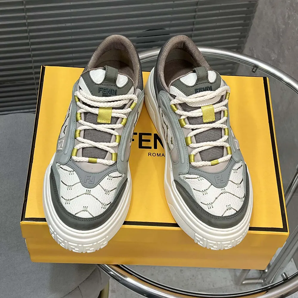 Close-up of embossed logo detail on Fendi Force Sneakers in white and green