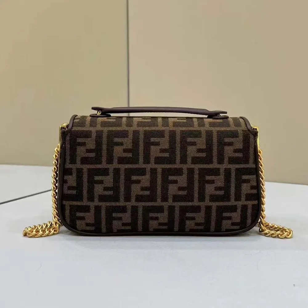 Side profile showing midi baguette silhouette of Fendi Women Baguette Chain Bag