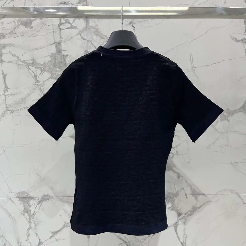 Side angle showcasing Fendi Women Black FF Viscose Sweater silhouette and fabric texture