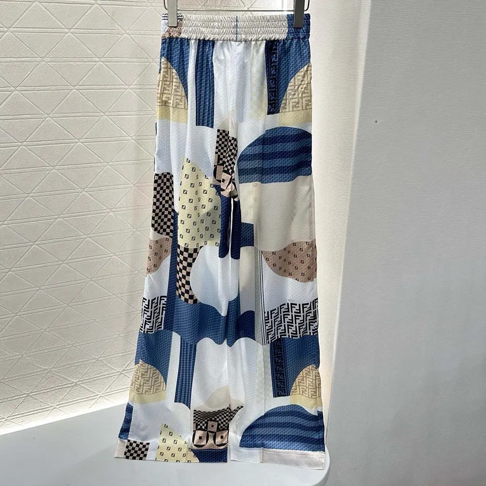 Side profile showing silhouette of Fendi Women Blue Silk Pants