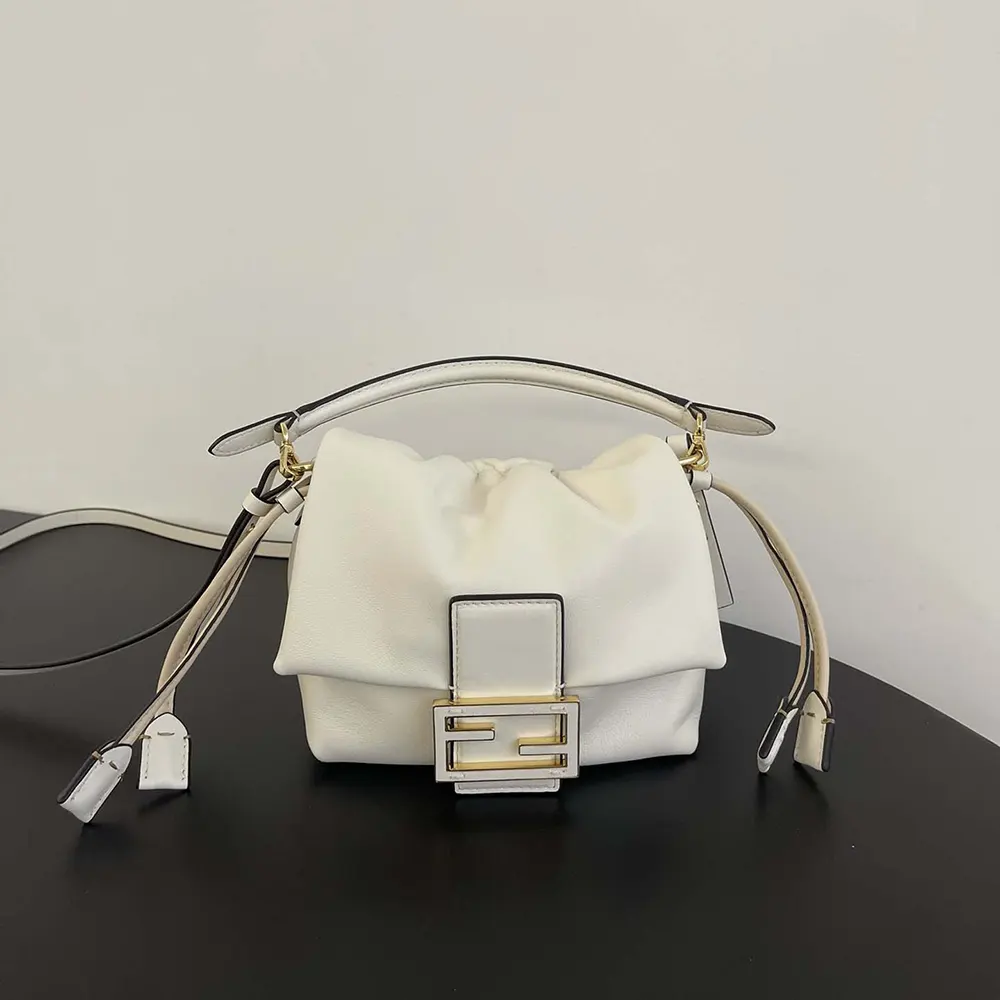Close-up of gold-tone hardware on Fendi Women Mamma Baguette Mini Bag