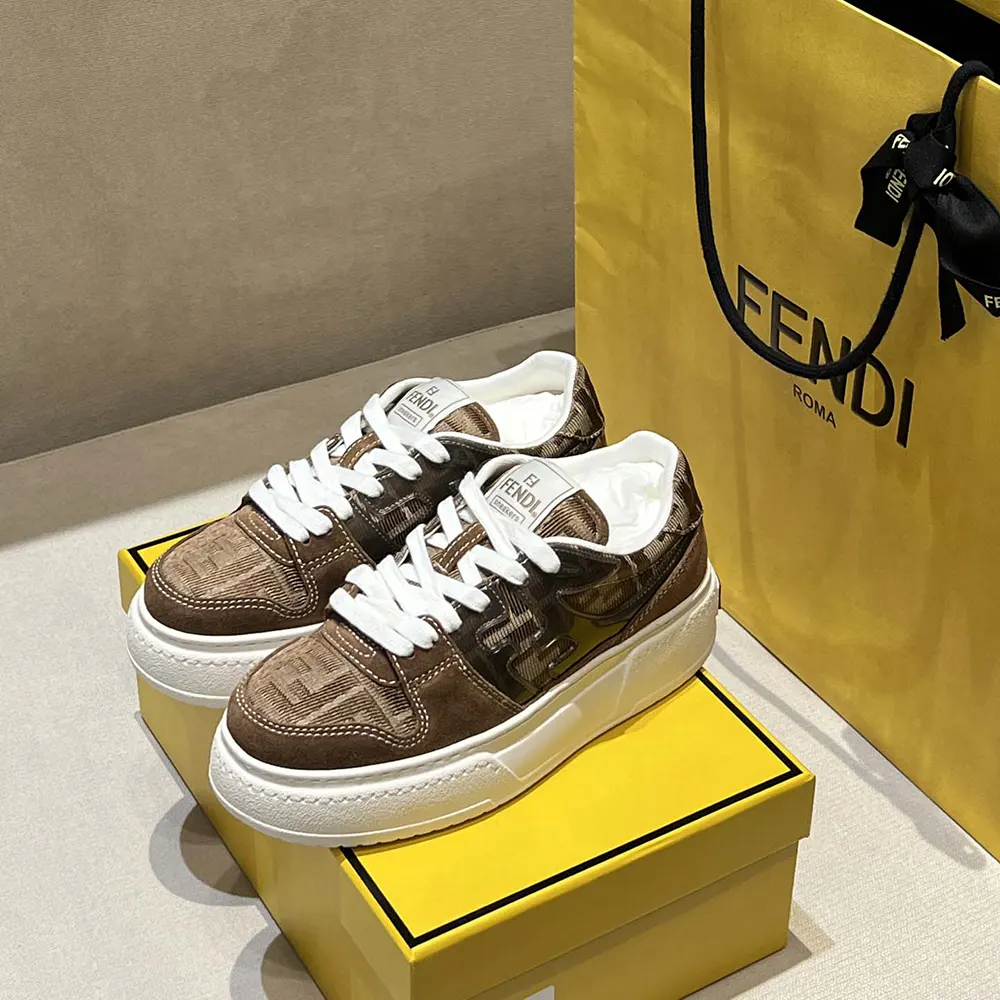 Close-up detail of FF jacquard and suede on Fendi brown platform sneakers