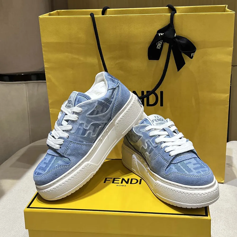 Close-up on Fendi FF jacquard pattern and light blue suede detail