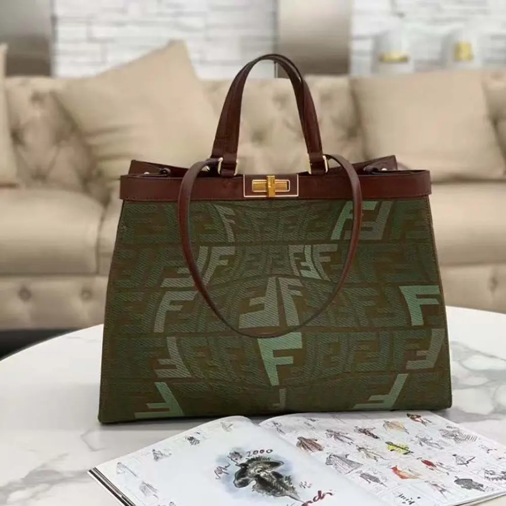 Close-up of embroidered floral detail on Fendi Women Peekaboo X-Tote