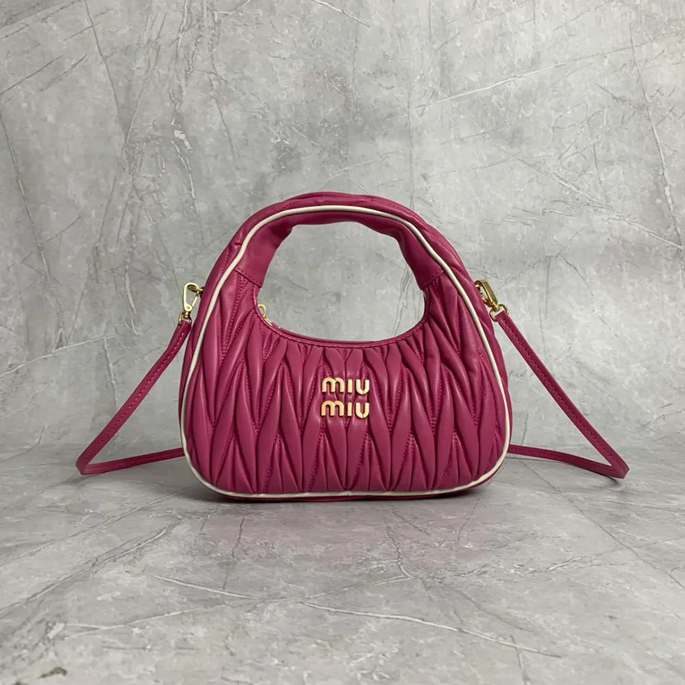 Close-up of pink-white matelassé quilting on Miu Miu Women Wander bag