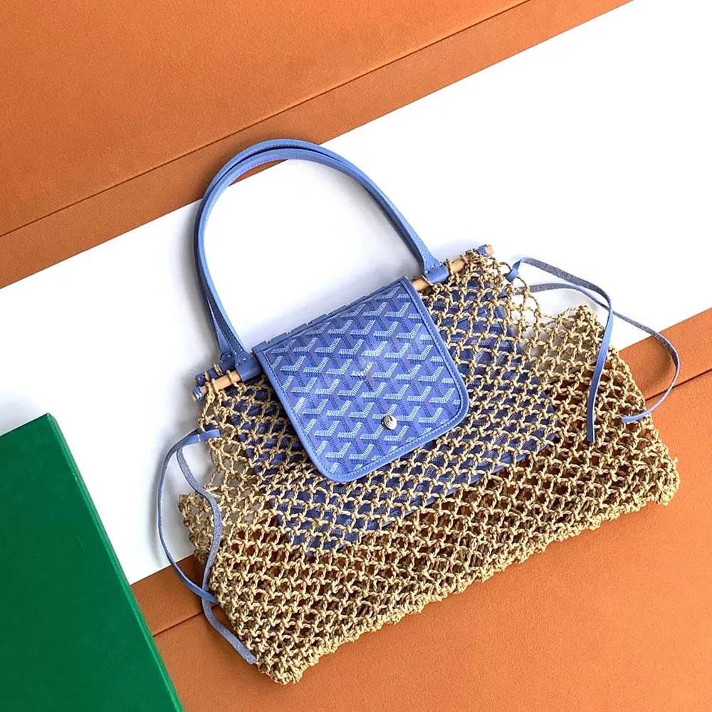 Close-up of brass hardware and signature chevron pattern on Goyard Aligre Bag