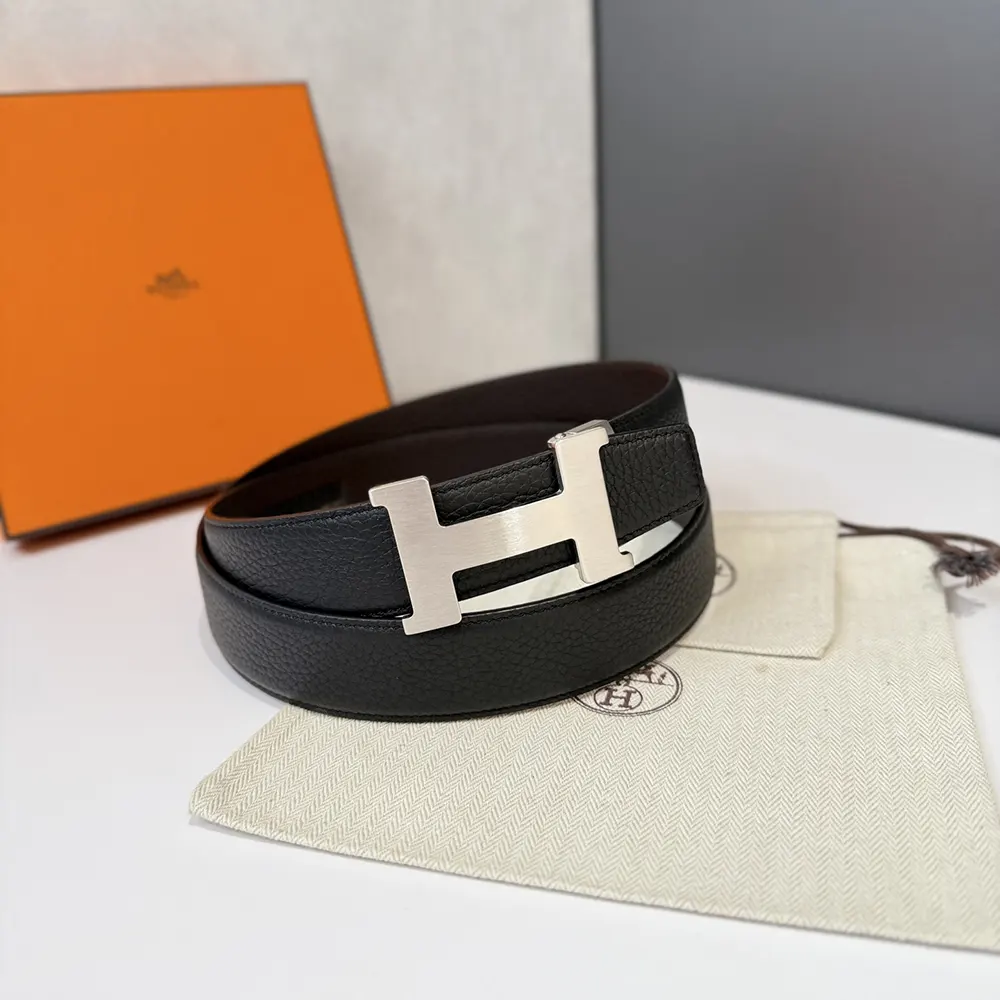 Side angle showing reversible leather strap detail on Hermes belt