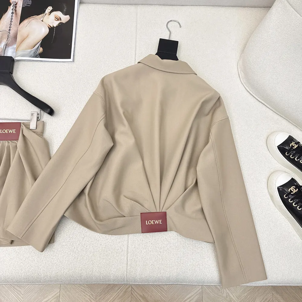 Side angle showing silhouette of Loewe Women Draped Jacket in khaki brown