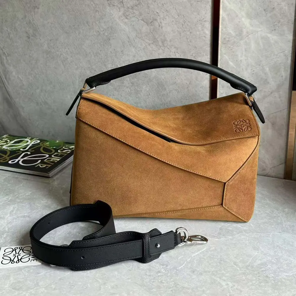 Close-up of magnetic closure and silver hardware on Puzzle Bag
