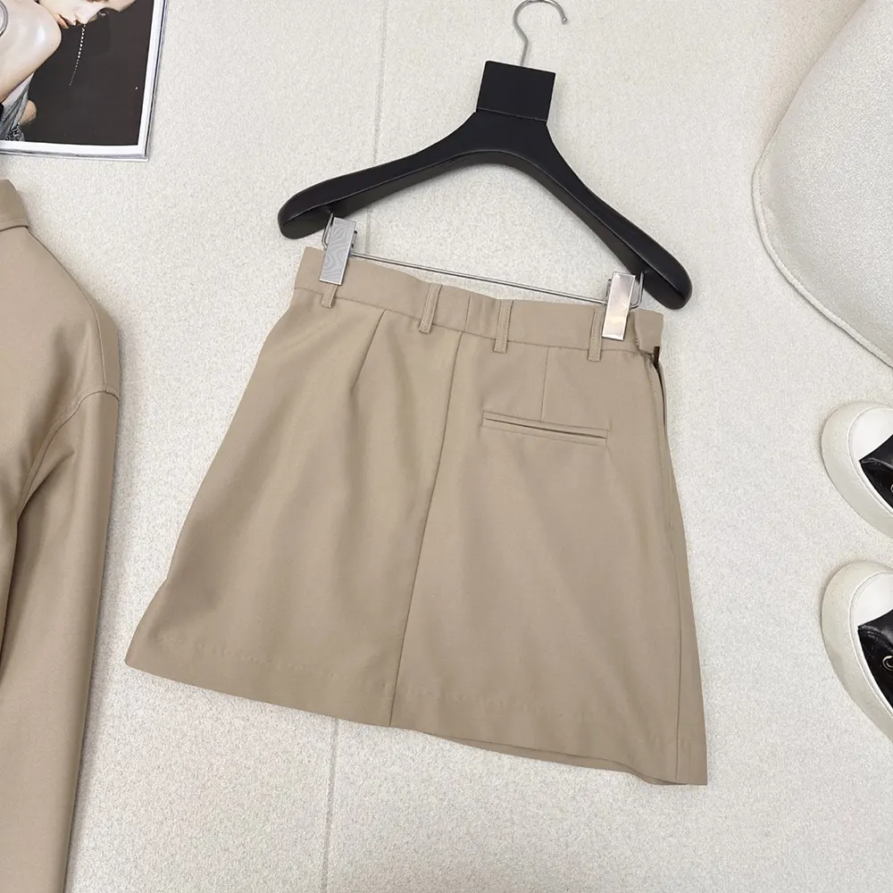 Side angle showing silhouette of Loewe Women Draped Skirt in brown