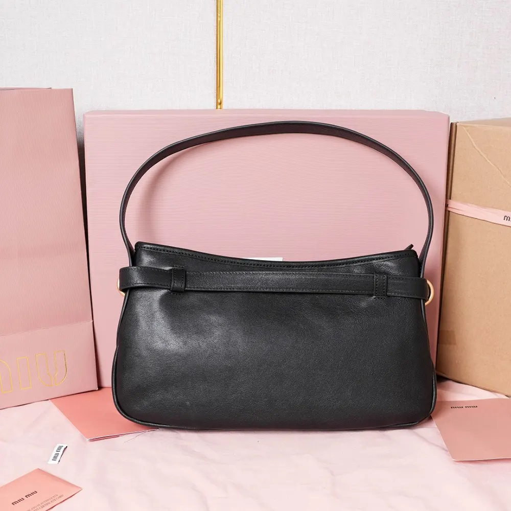Side profile showing compact silhouette of Miu Miu Women Aventure Nappa Leather Bag-Black