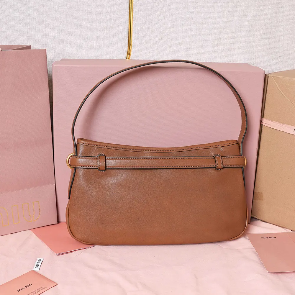 Side angle of Miu Miu Women Aventure Nappa Leather Bag-Brown with shoulder strap
