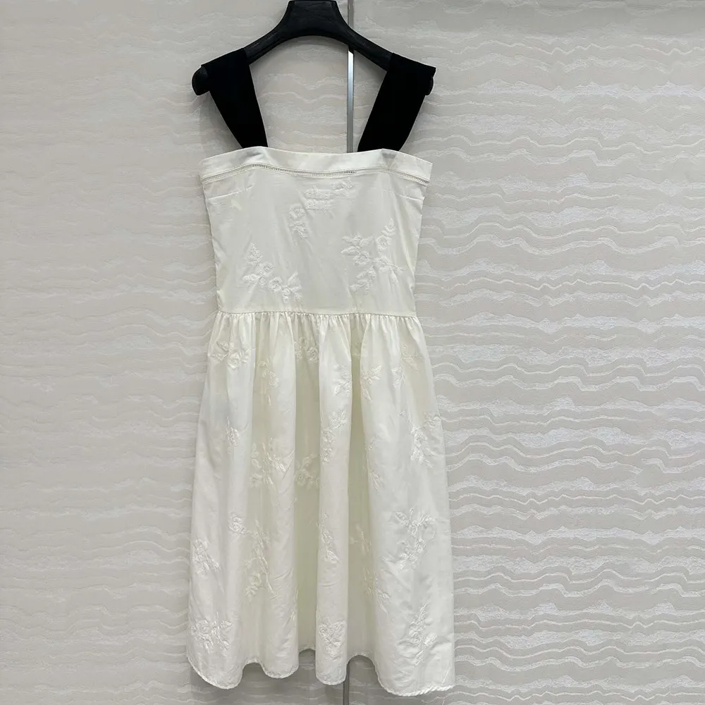 Back view showing concealed zip on Miu Miu Women Embroidered Batiste Dress