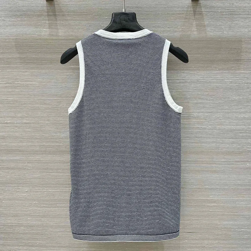 Side profile showing fitted silhouette of Miu Miu Women Petit Bateau X Miu Miu Ribbed Jersey Top