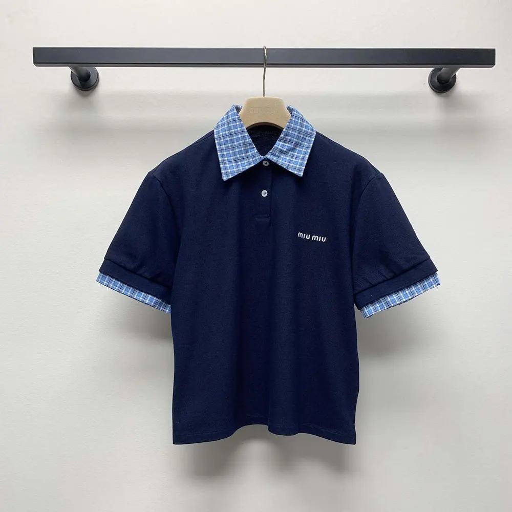 Close-up detail of collar and buttons on Miu Miu polo shirt