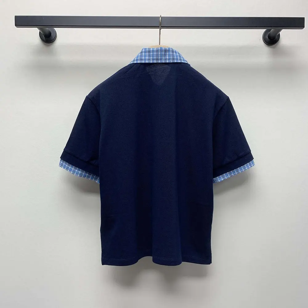 Side angle showcasing slim fit of Miu Miu Women Piqué and Poplin Polo Shirt
