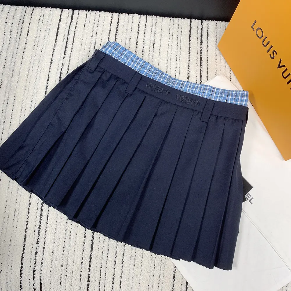 Close-up detail of pleats on Miu Miu Women Pleated Batavia Miniskirt