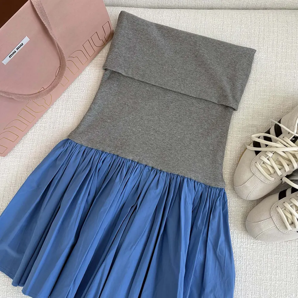 Side angle showing silhouette of Miu Miu Women Poplin and Jersey Miniskirt-Blue