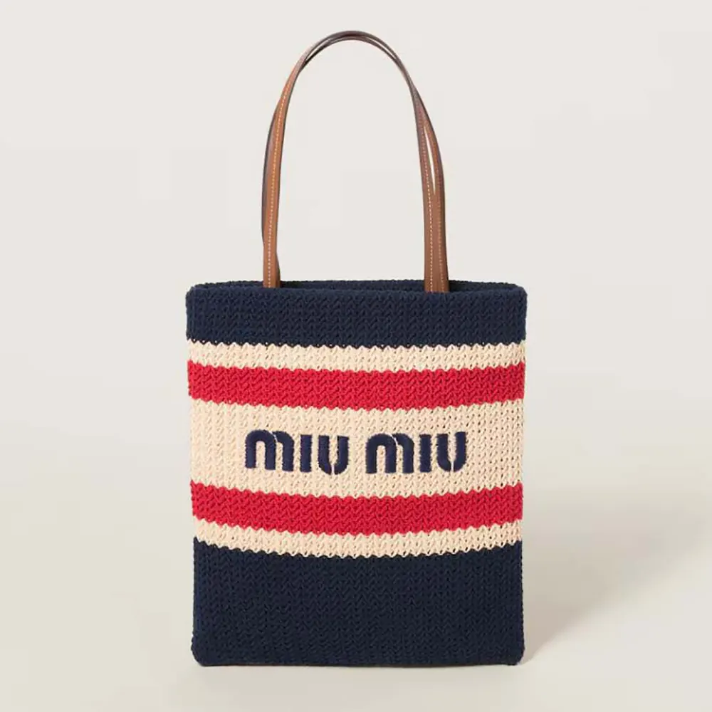 Front view of Miu Miu Women Raffia-effect Woven Tote Bag in vibrant red