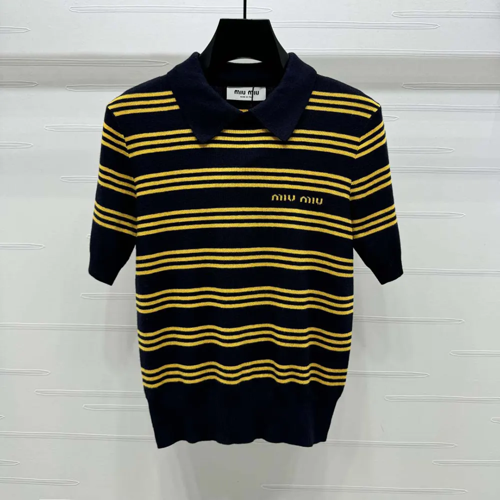 Close-up of yellow stripes and knit texture on Miu Miu polo sweater
