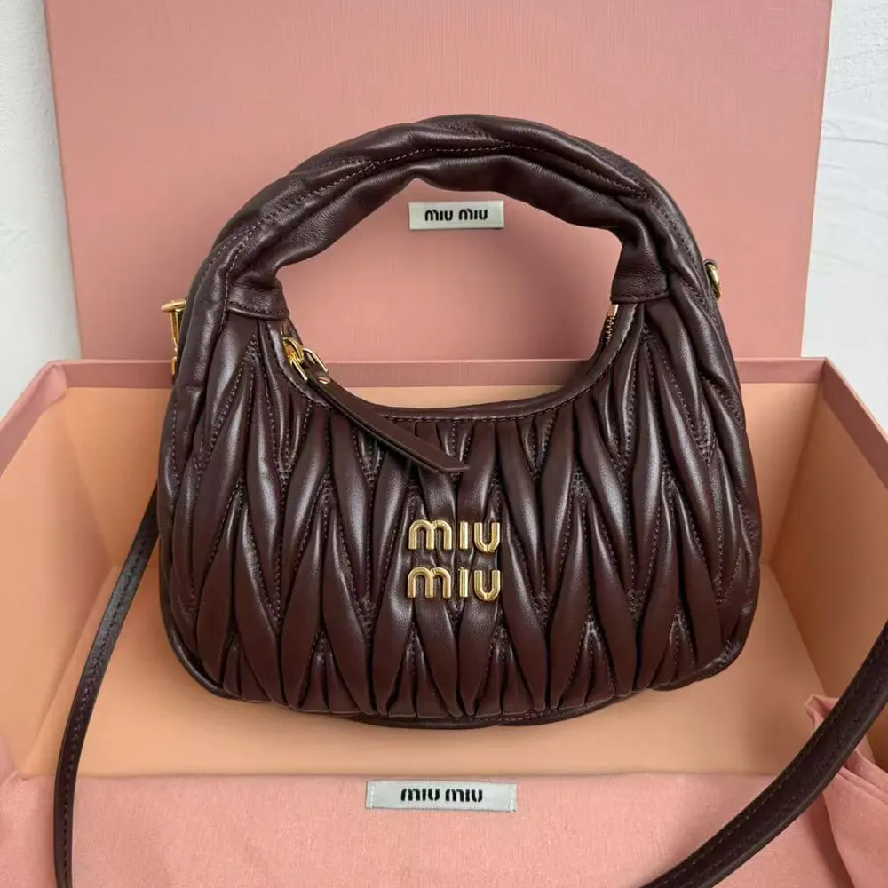 Close-up of chocolate matelassé leather texture on Miu Miu Women Wander Hobo Bag