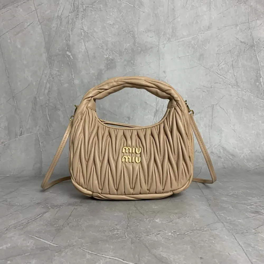 Close-up detail of matelassé stitching on Miu Miu Women Wander hobo bag