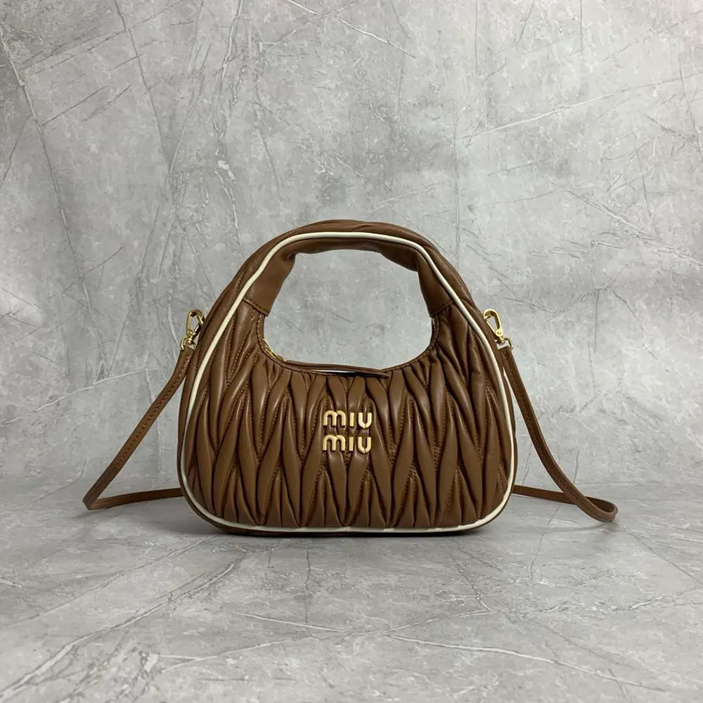 Close-up detail of matelassé texture on Miu Miu Women Wander Bag