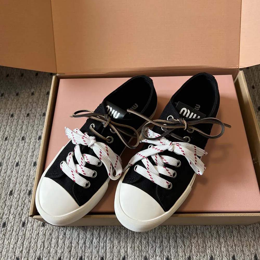 Top view highlighting laces and subtle Miu Miu logo hardware