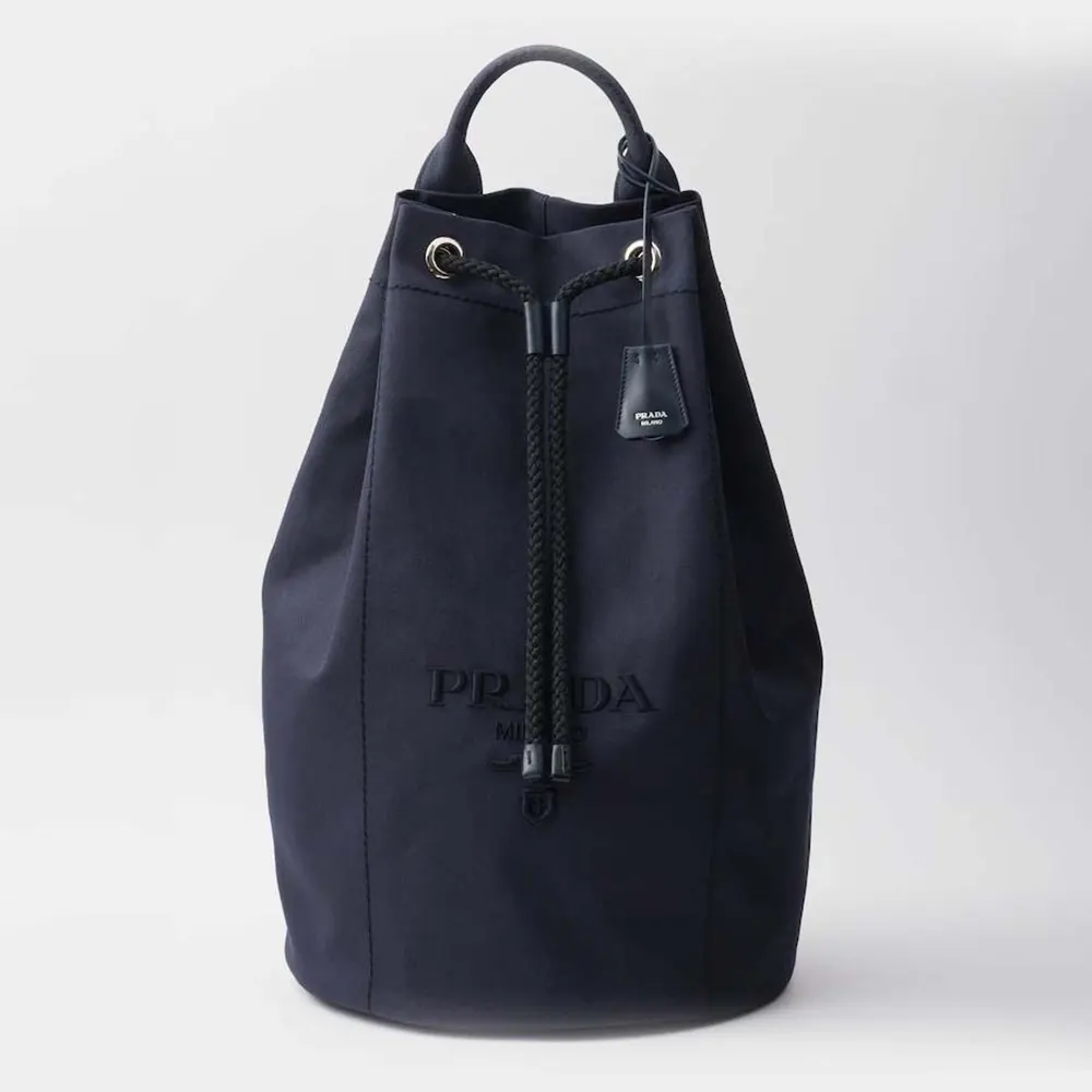 Front view of Prada Unisex Canvas Drawstring Duffle Bag in navy