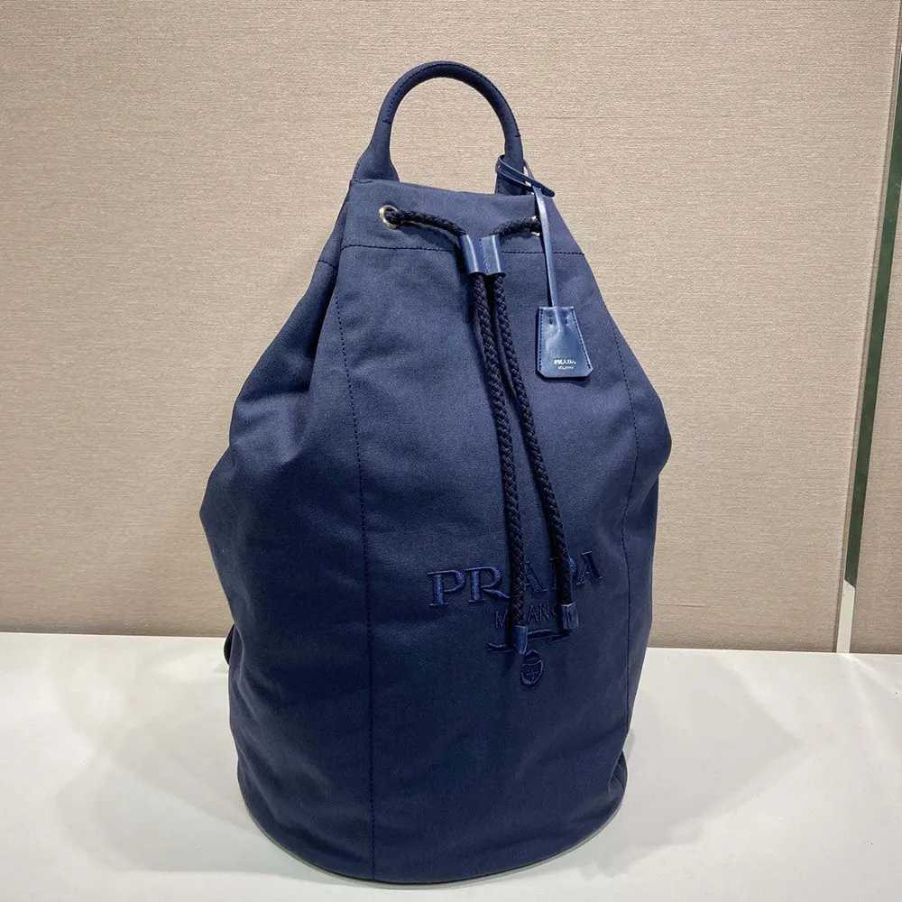 Close-up detail of drawstring closure on Prada Unisex Canvas Drawstring Duffle Bag