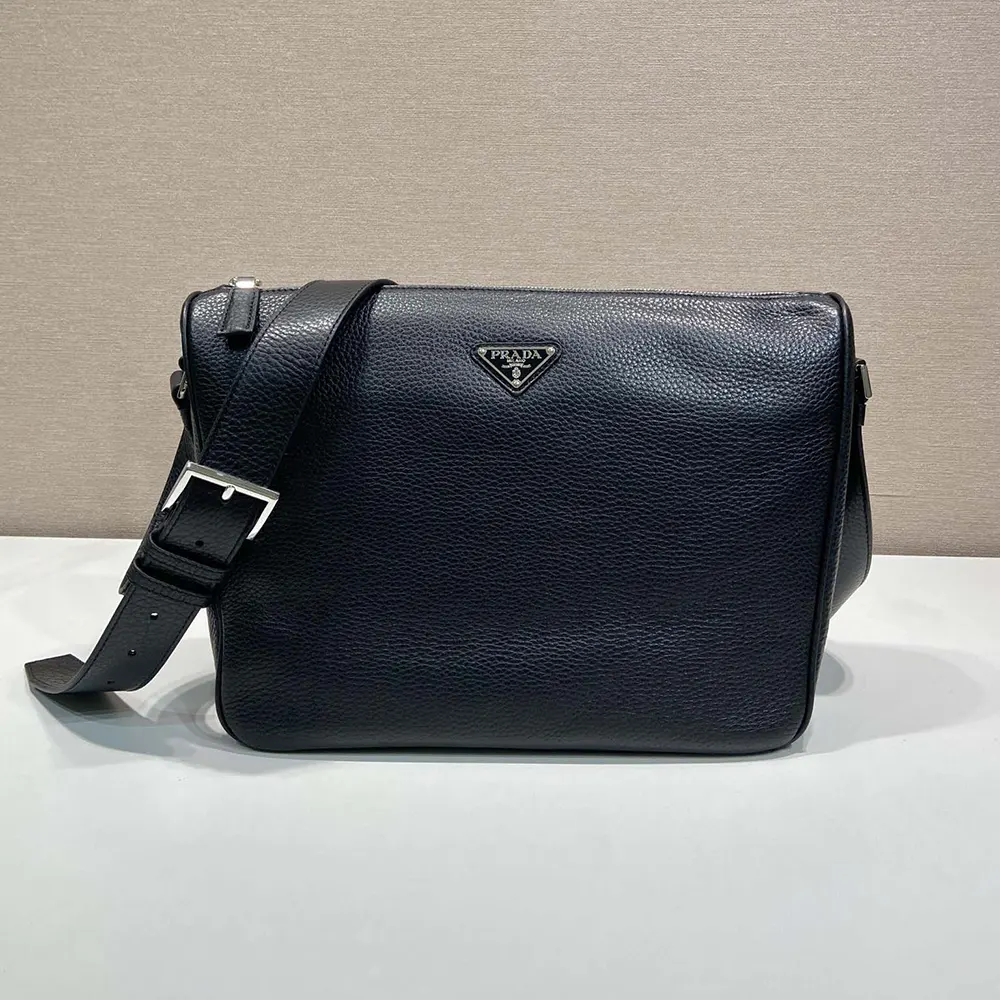 Close-up of silver-tone hardware on Prada Unisex Medium Leather Shoulder Bag-Black