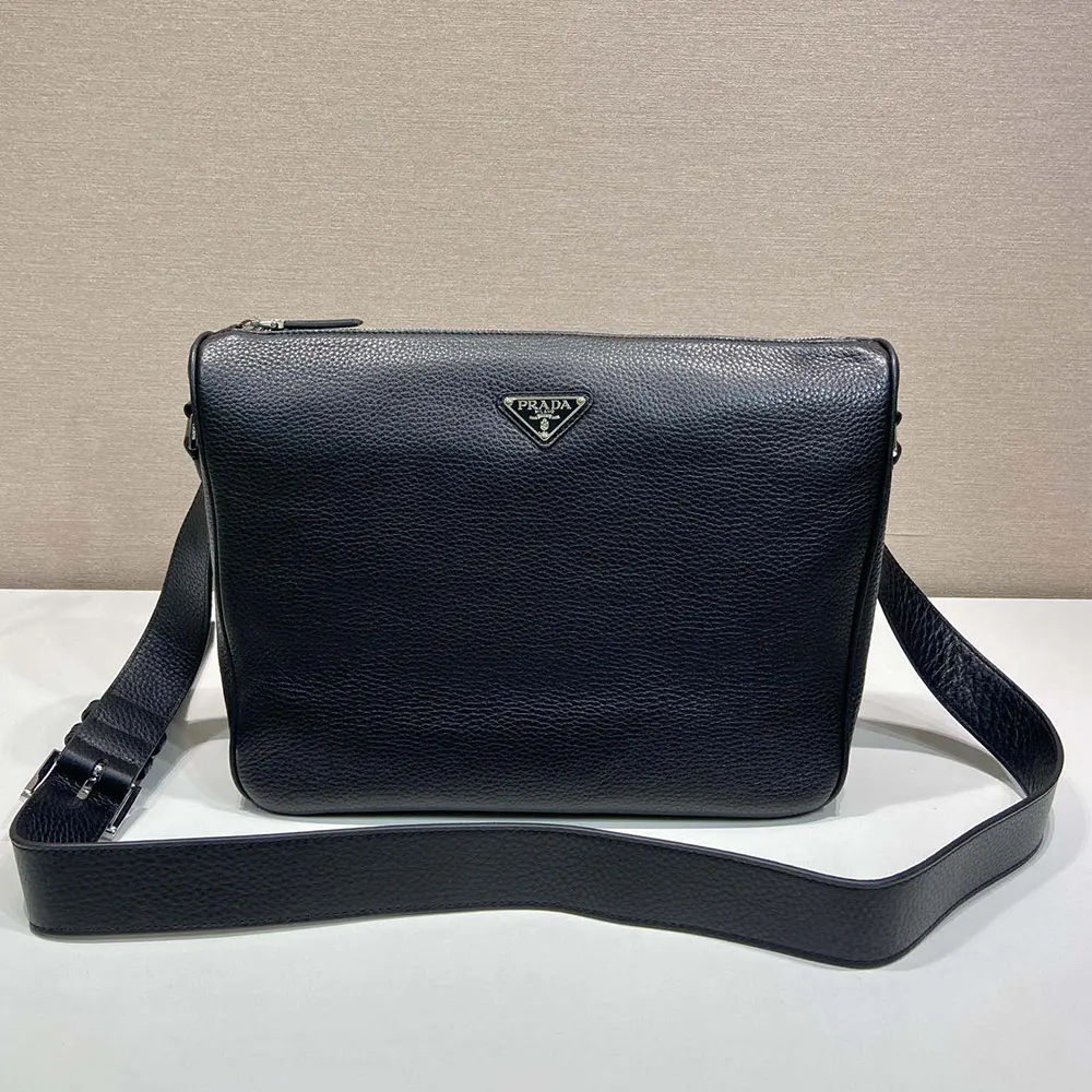 Side angle highlighting leather texture of Prada Unisex Medium Leather Shoulder Bag-Black