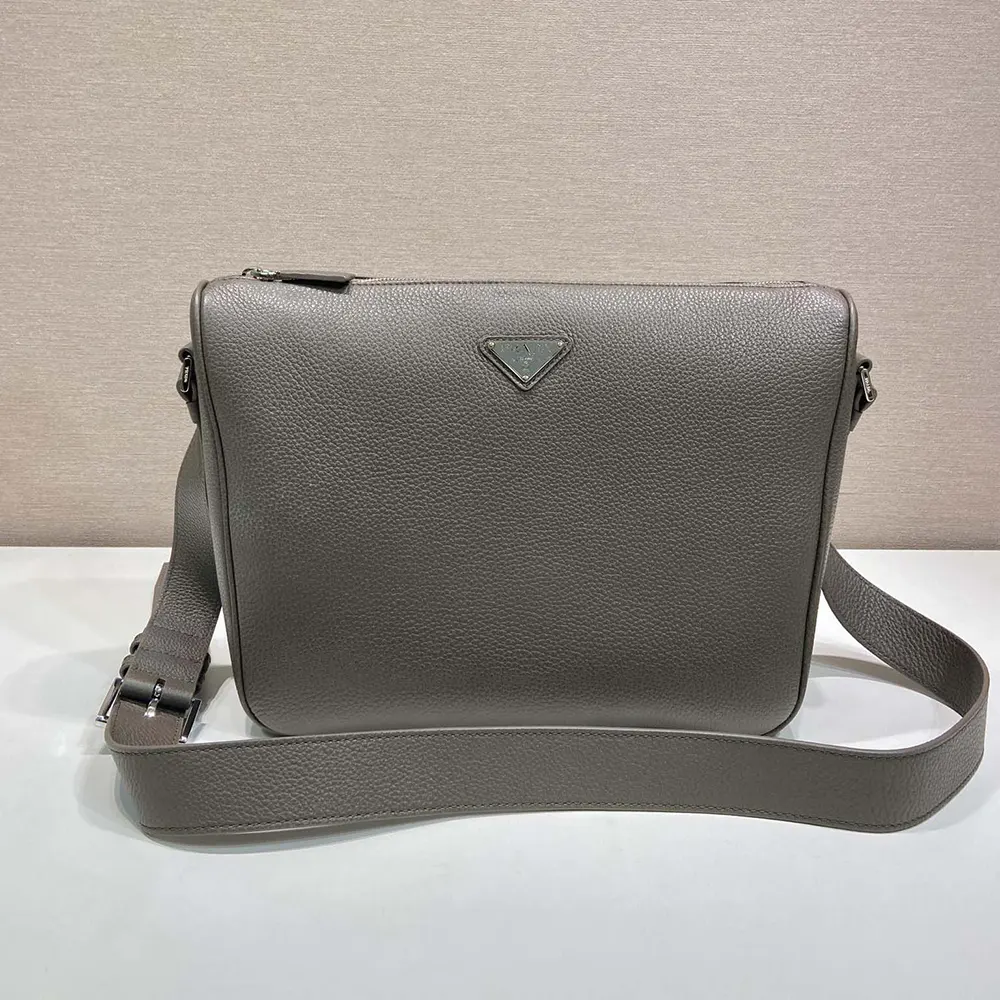 Side view highlighting adjustable strap on Prada Unisex Medium Leather Shoulder Bag-Gray