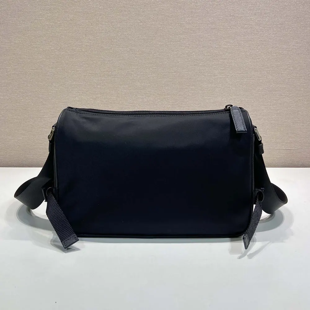 Side angle showing adjustable strap of Prada Unisex Medium Re-Nylon Shoulder Bag