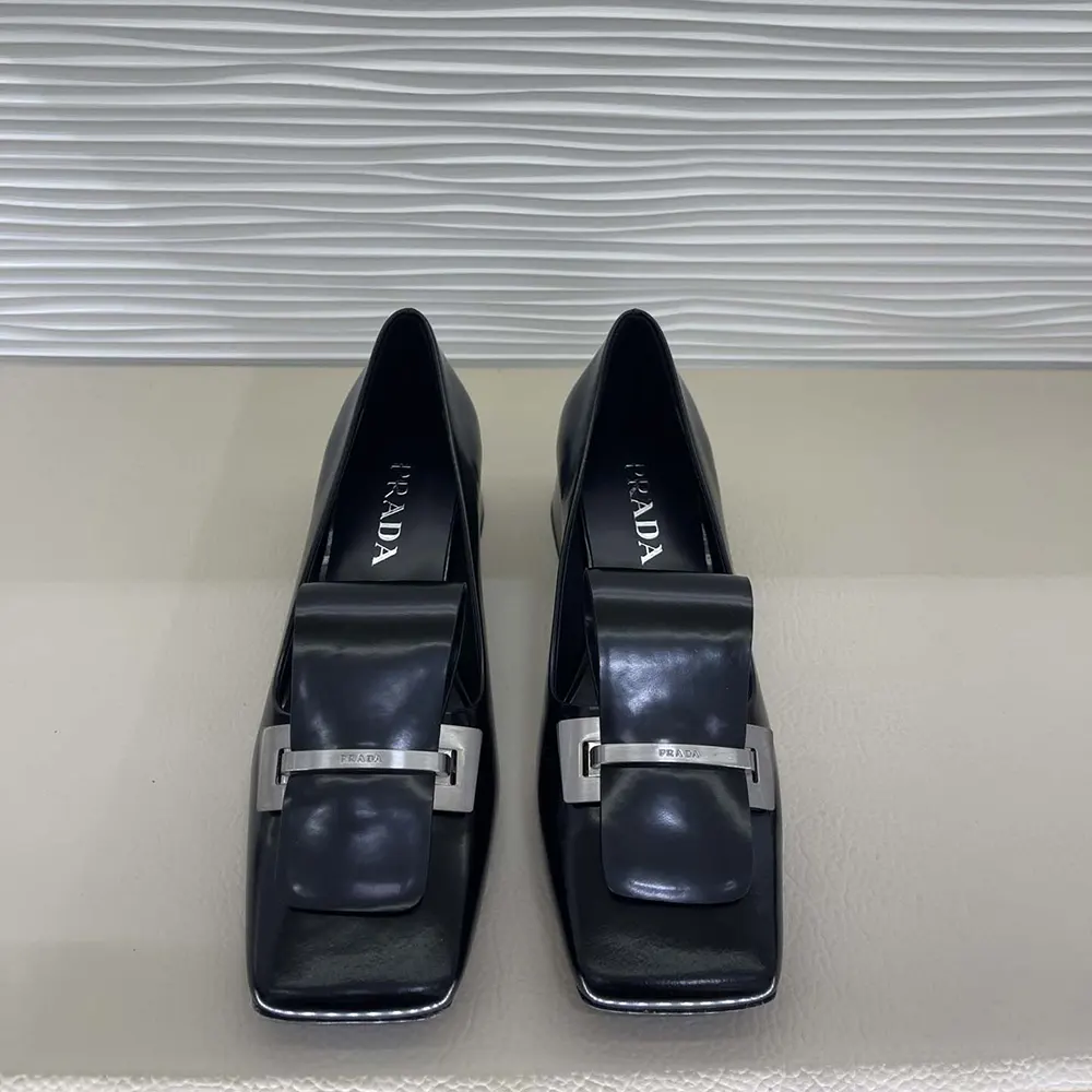 Close-up of brushed leather texture on Prada Women Brushed Leather Pumps-Black