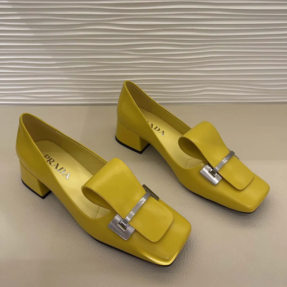Top angle showing silhouette of Prada Women Brushed Leather Pumps-Yellow
