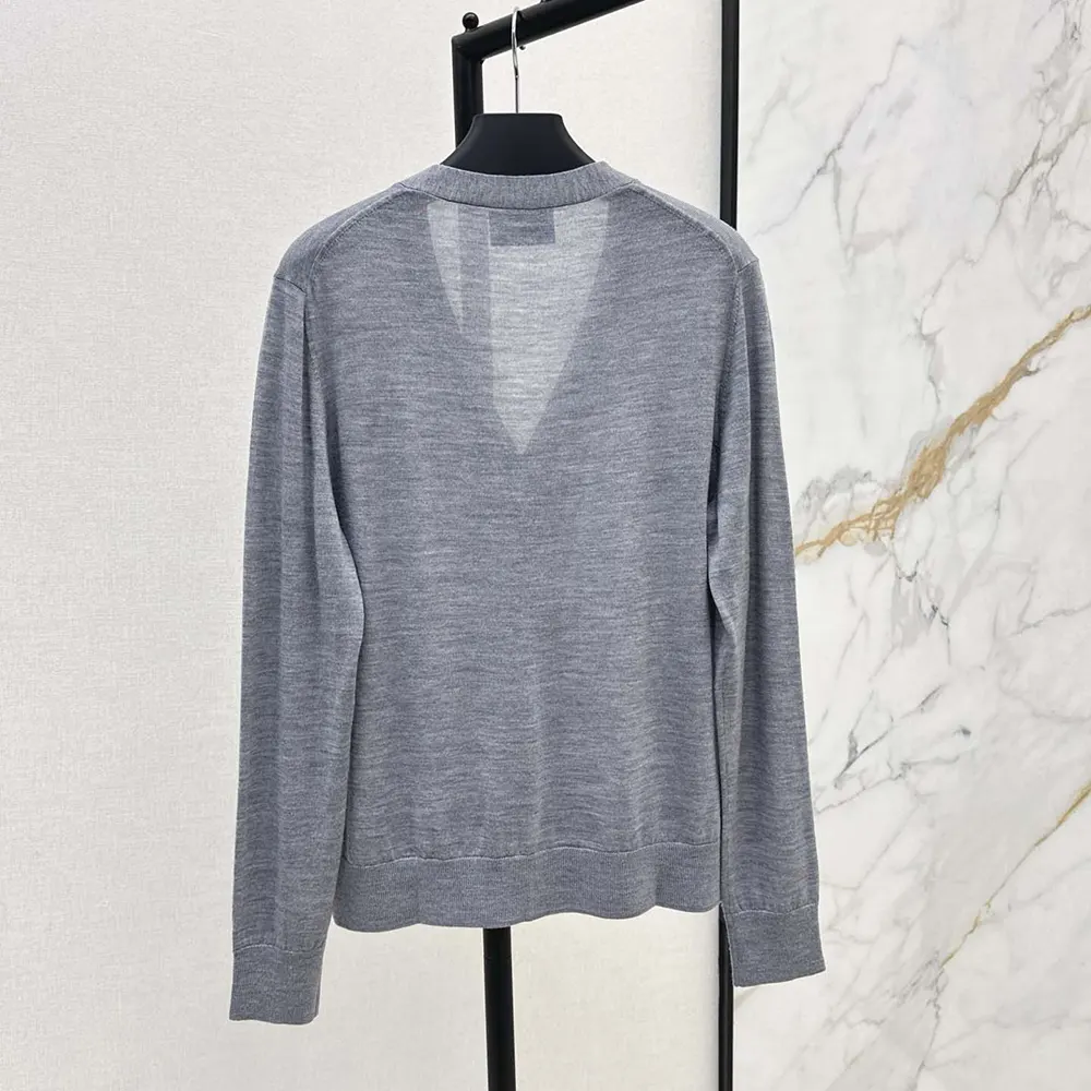 Side profile of Prada Men Cashmere Cardigan-Gray highlighting fit and texture