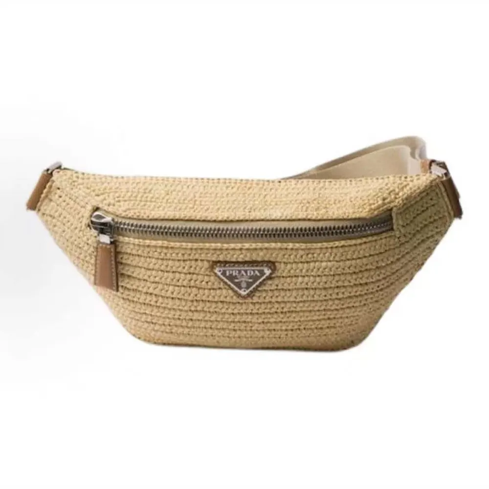 Close-up of woven texture and gold hardware on Prada Women Woven Crochet Belt Bag-Natural