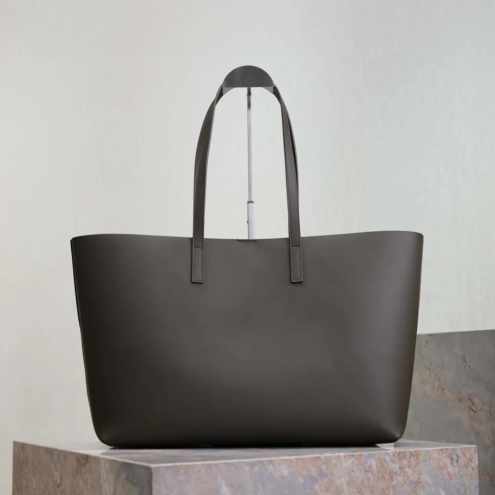 Side angle showing silhouette of Saint Laurent YSL Women Shopping Saint Laurent