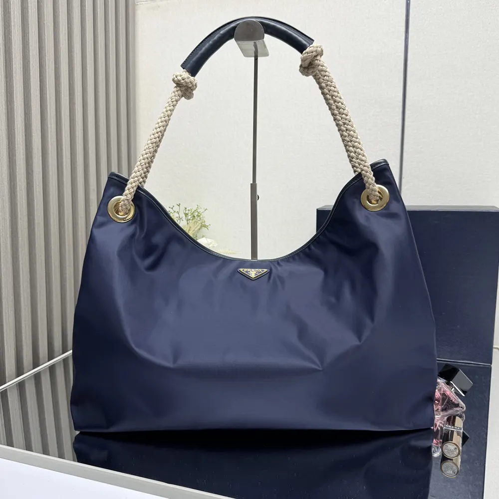 Close-up of silver hardware on Prada Women Mariner Large Re-Nylon Bag