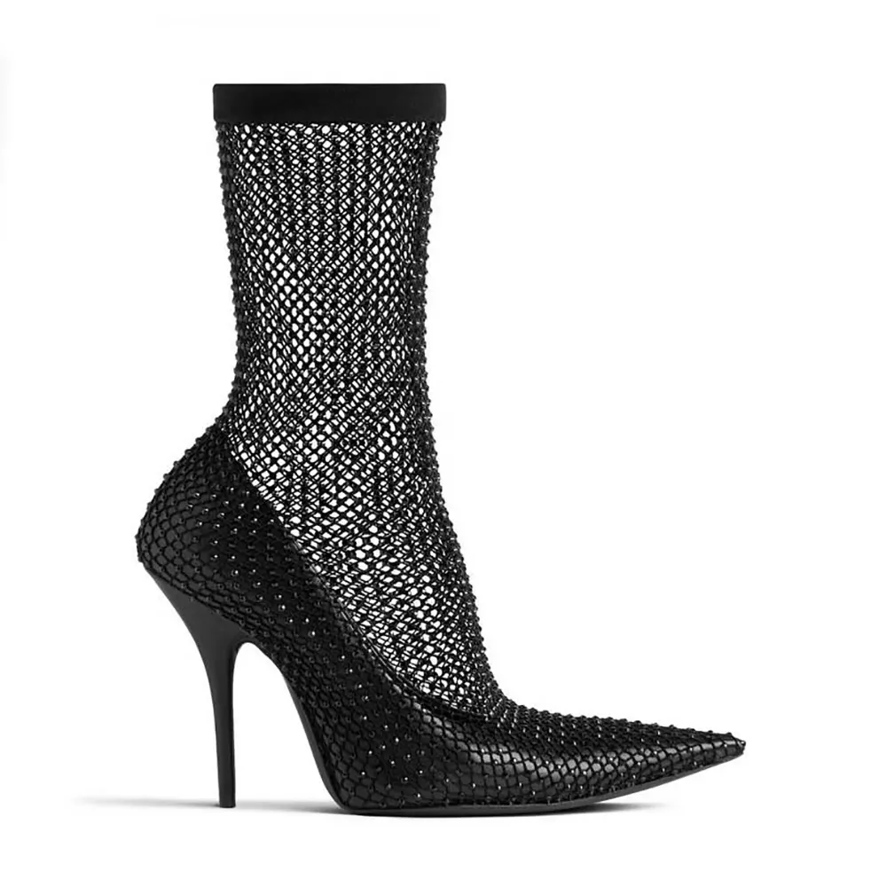 Side view of Balenciaga Women Avenue 110mm Bootie in black shiny nappa