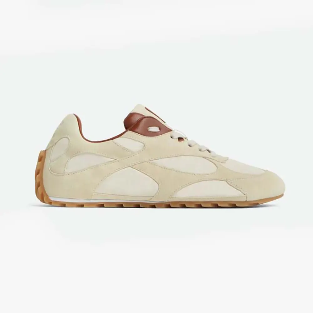 Side profile of Bottega Veneta Unisex Orbit Flash Sneaker-Beige