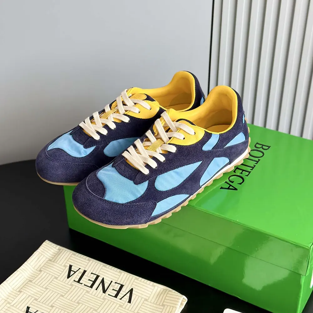 Close-up of lace-up and signature leather weave on Orbit Flash Sneaker-Blue