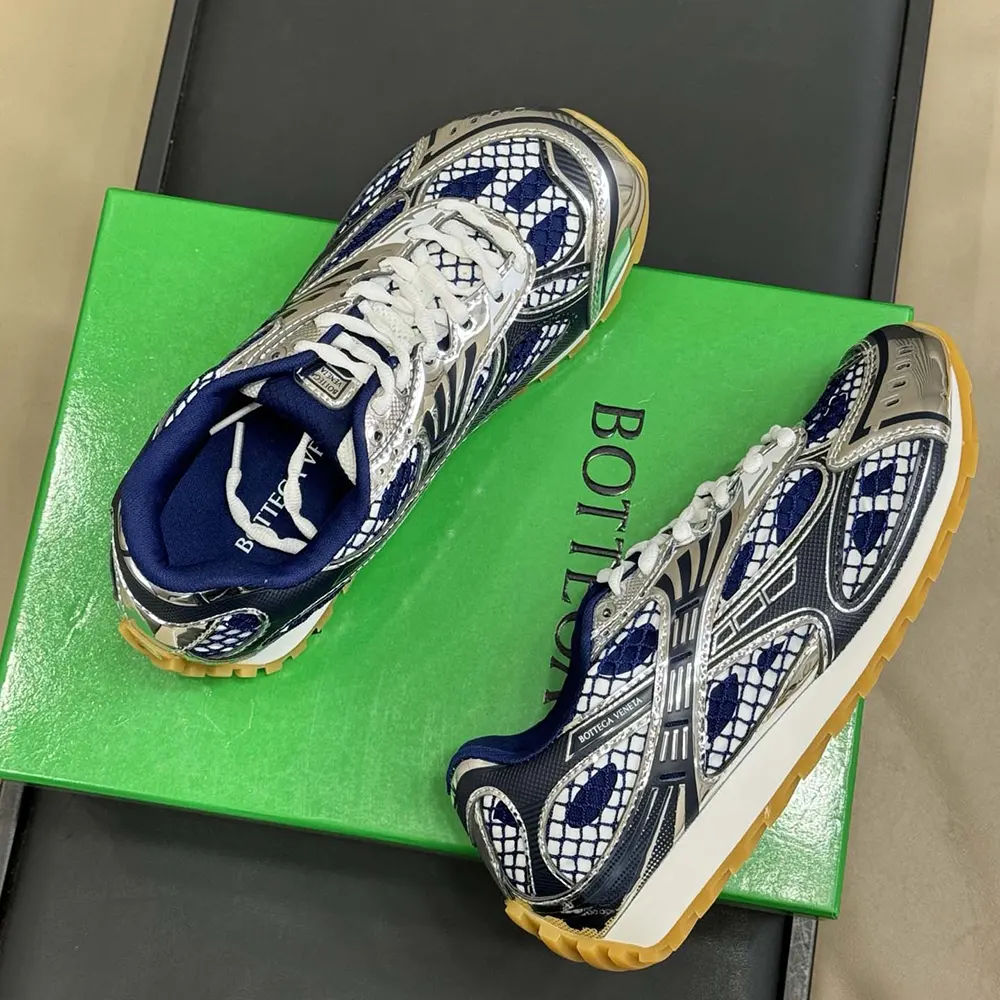 Top view of Bottega Veneta Unisex Orbit Sneaker-Navy highlighting laces and texture