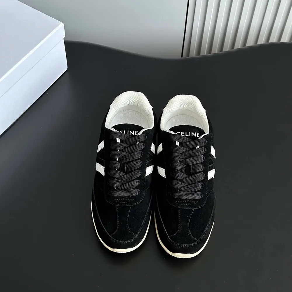 Top angle showing lace-up detail and silhouette of Celine Unisex Jogger Low Sneaker